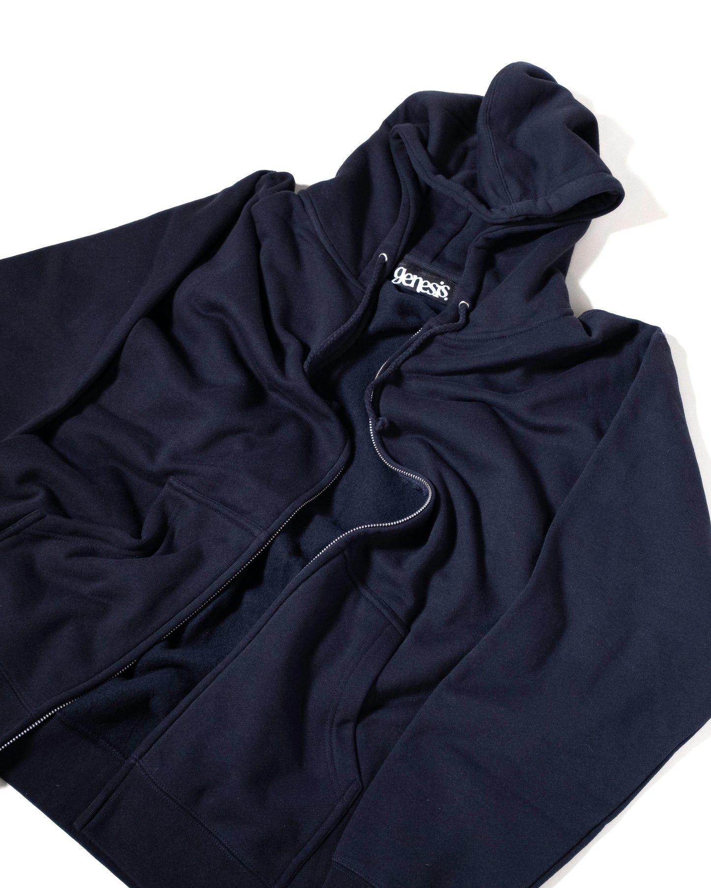 Black hoodie with 'Genesis' logo on a white background