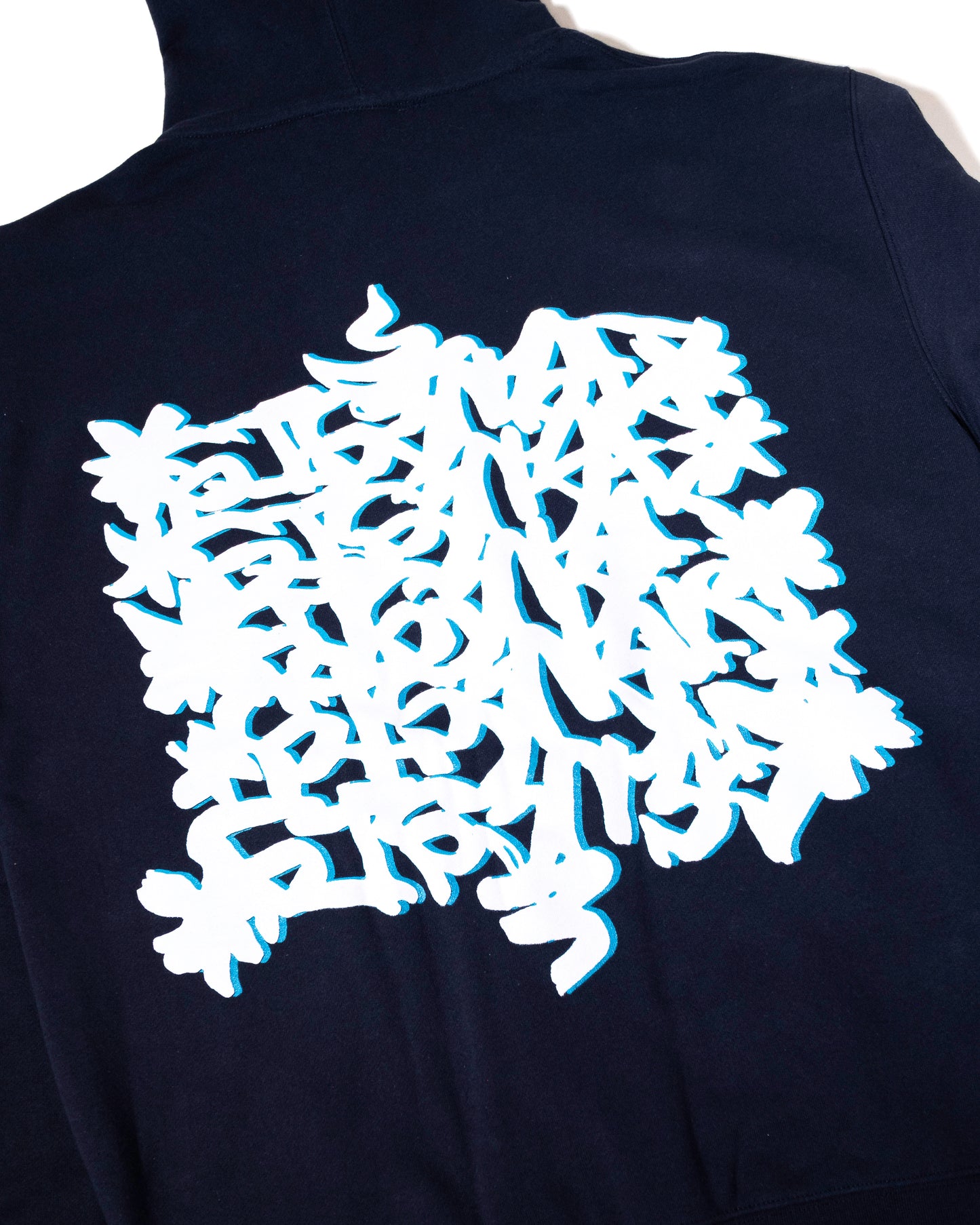 Black jacket with white floral pattern on the back